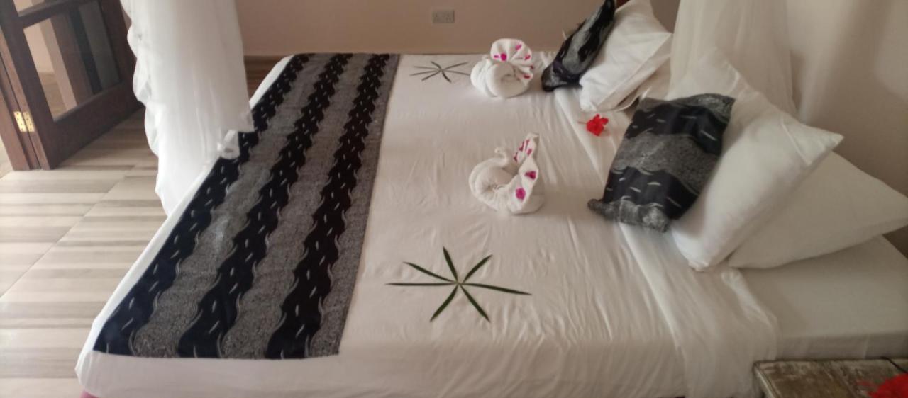 Eleven Pearl Boutique Hotel & Spa Diani Beach Esterno foto